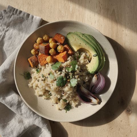Photo du déjeuner envoyée à Ava : bowl de légumes rôtis, pois chiches, quinoa et avocat